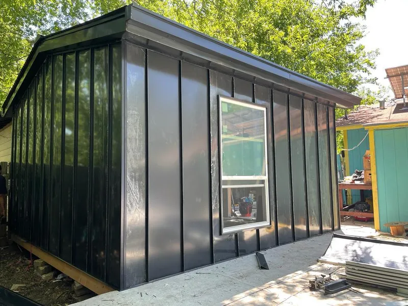 Black standing seam metal wall panels for Metal Roof Installation in East Huntingdon
